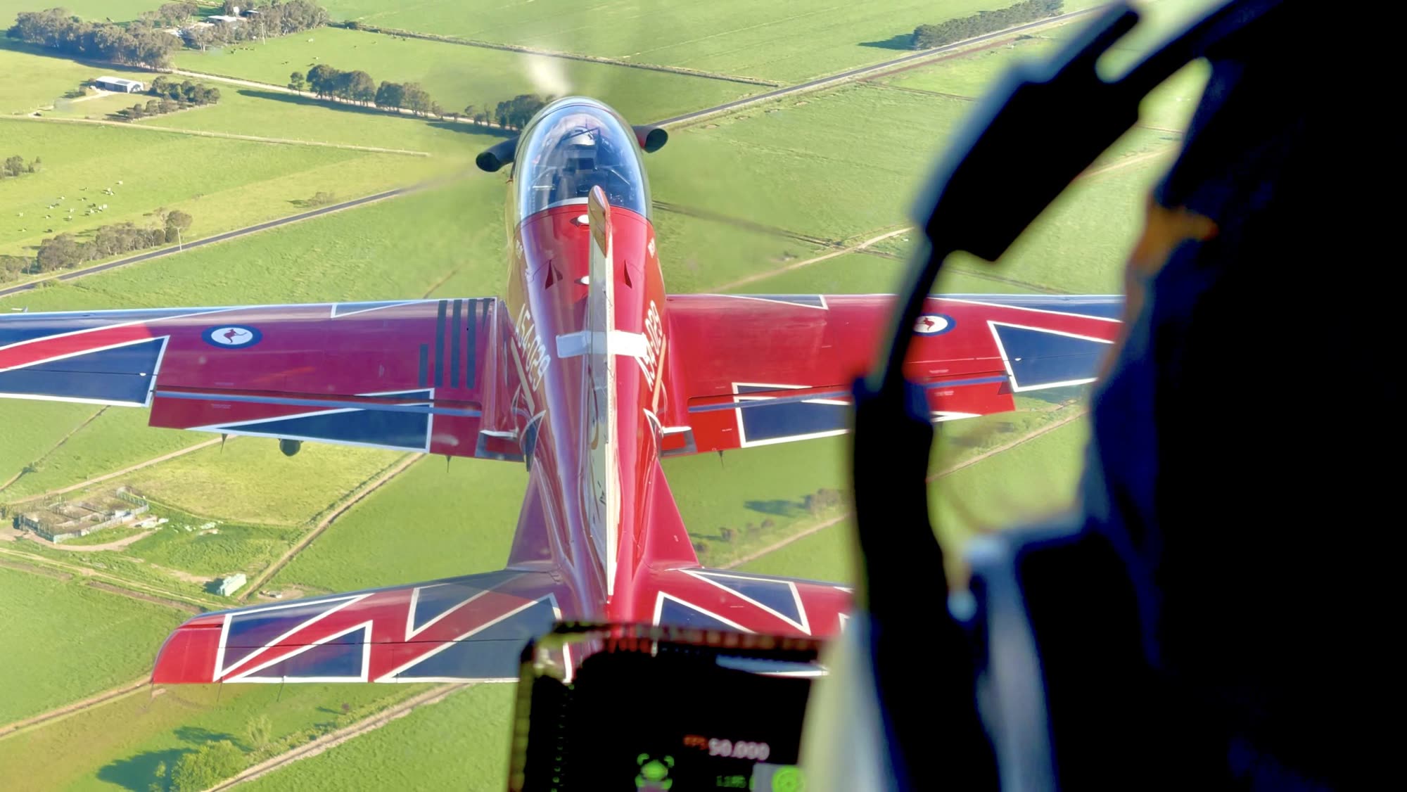 Air-to-air filming of the RAAF Roulettes aerobatic team in close formation